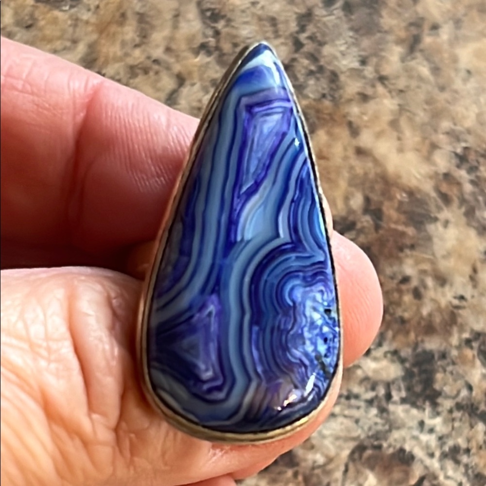 Blue Teardrop Ring with Swirling Patterns